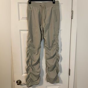 scrunched windbreaker tan pants